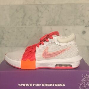 Nike White Sneakers with Coral and Bright Orange Accents